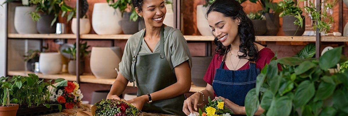 Two women working with flowers